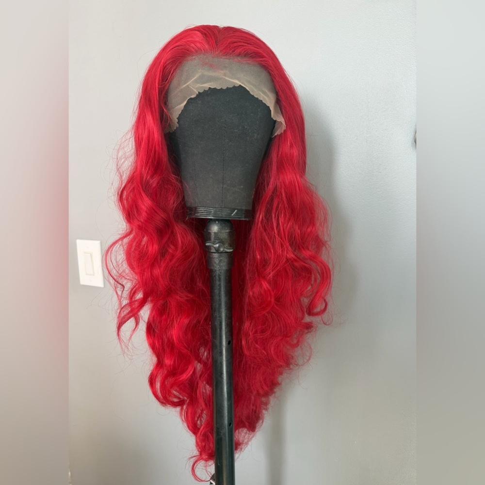 Brand new 13x4 red synthetic lace front wig. 32 inches